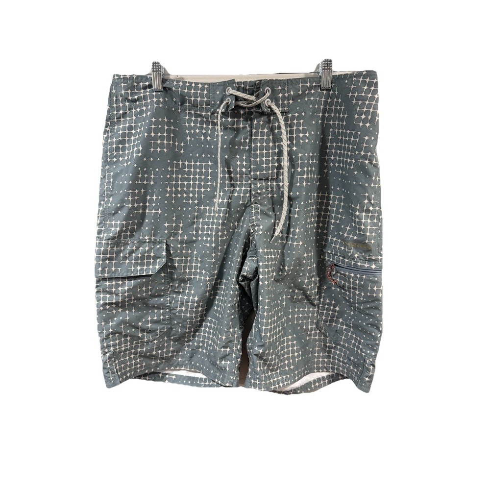 Simms fishing shorts featuring a grey and white geometric grid pattern Large